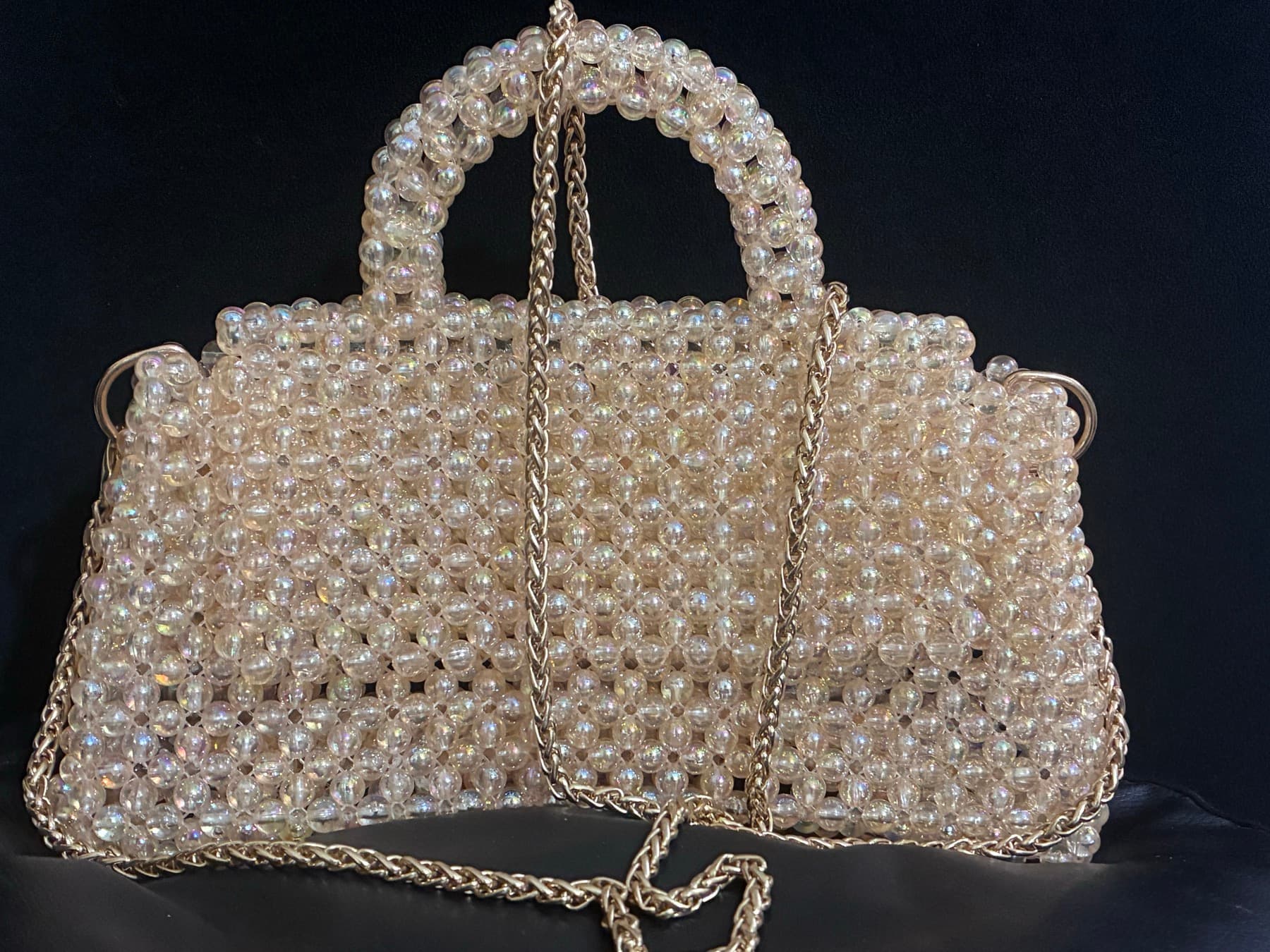 The Champagne Pearl — hand-strung iridescent beads and gold frame